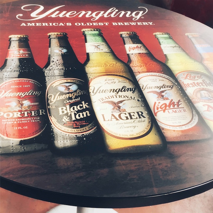Photographic tables can promote, elevate, and celebrate your brand