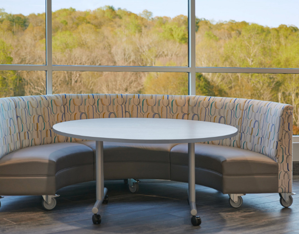 Curved booth seating with casters for a 60 inch round top