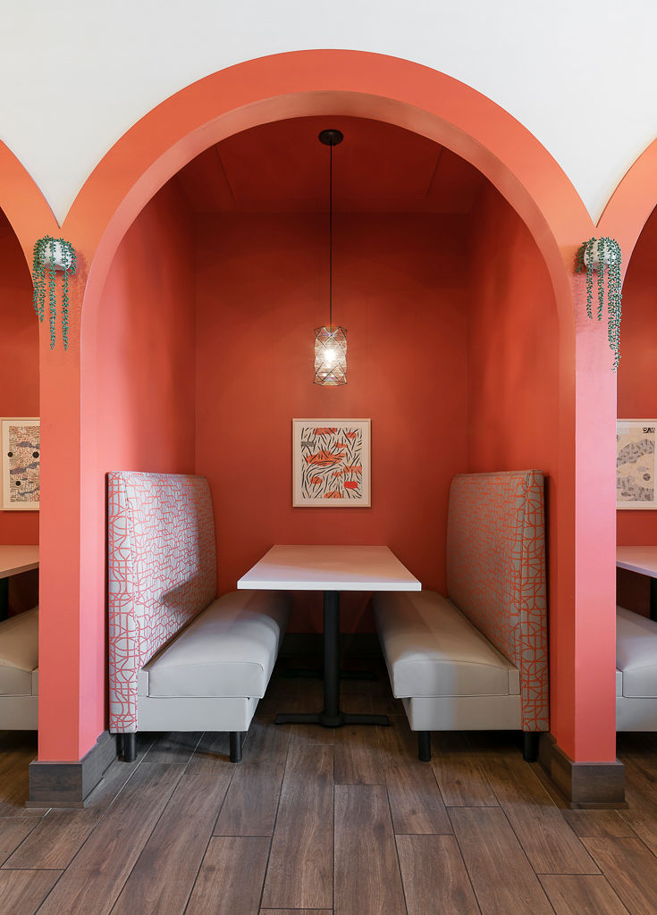 The textiles harmonize with the thoughtfully chosen artwork