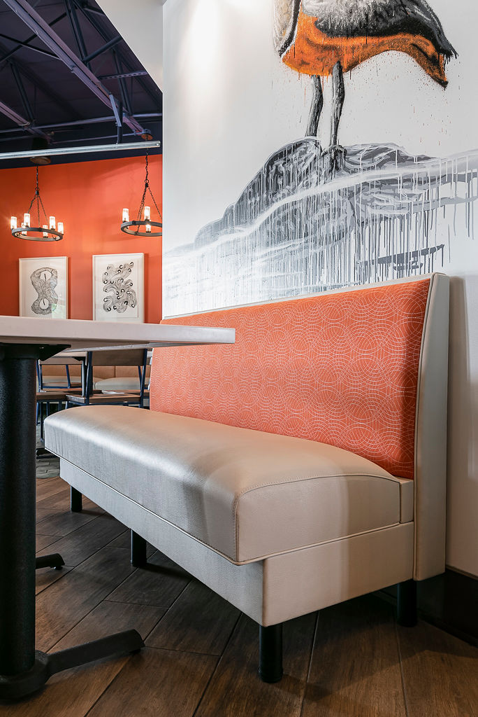 This Mercury Banquette was designed to run the length of the wall beneath the mural